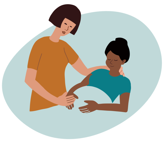 Doula helping pregnant person